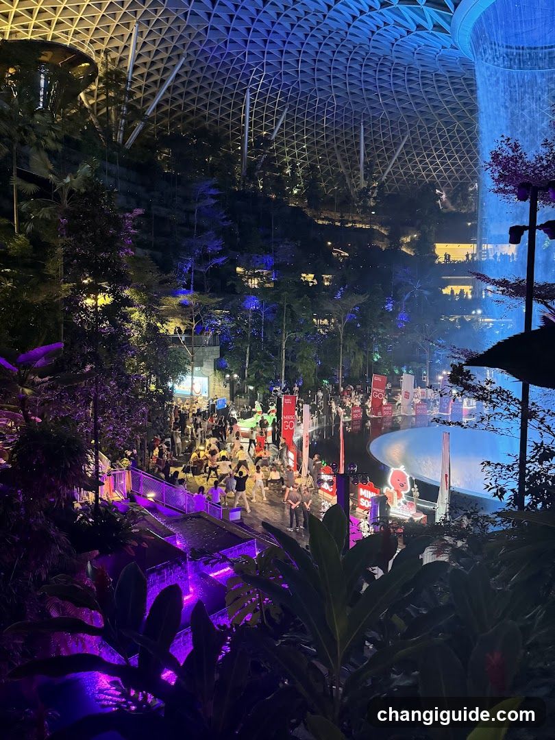 Indoor Night Scene with Waterfall and Crowd