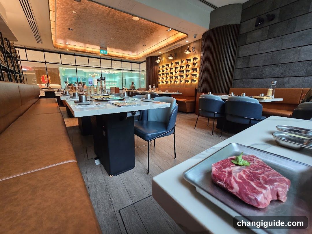 Interior of a modern restaurant with raw meat display