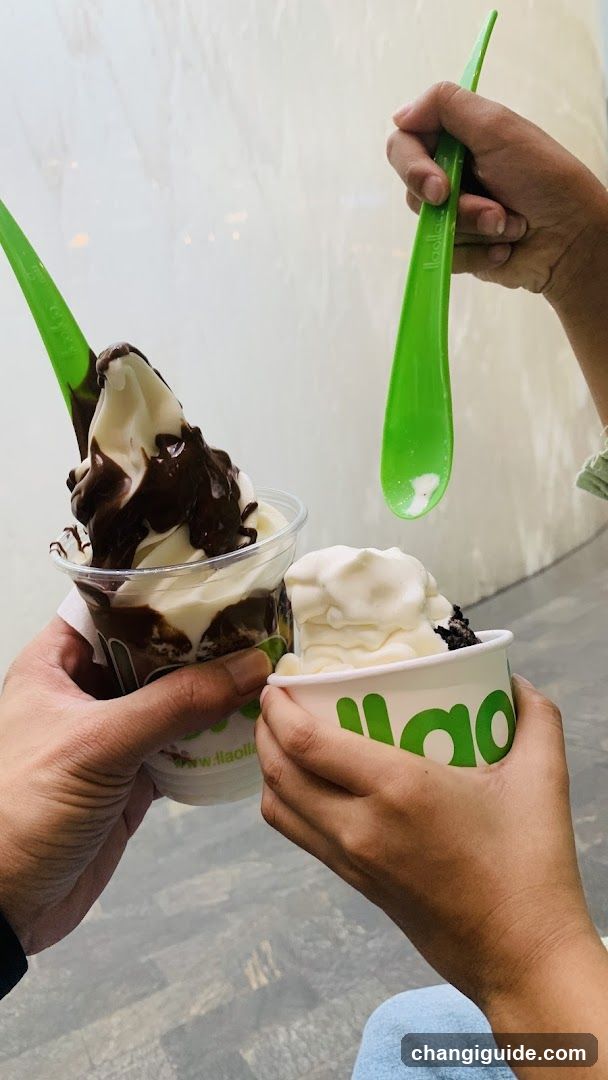 Ice cream cups with green spoons
