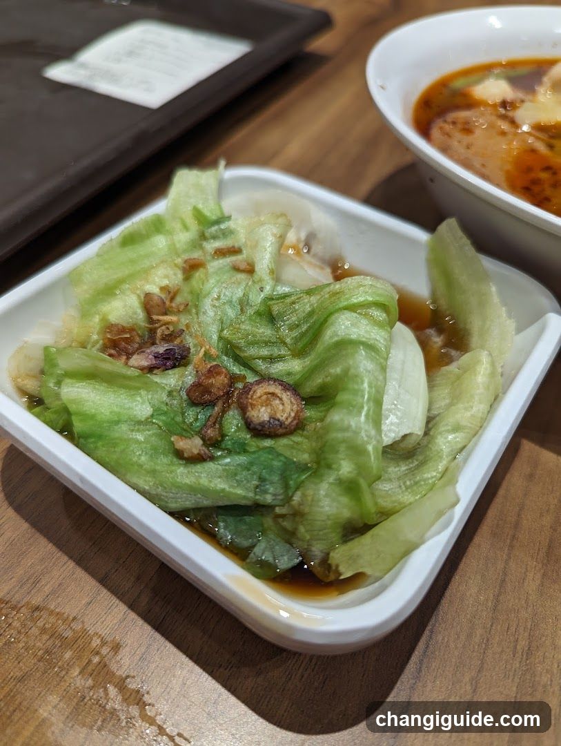 Dish with lettuce and sauce