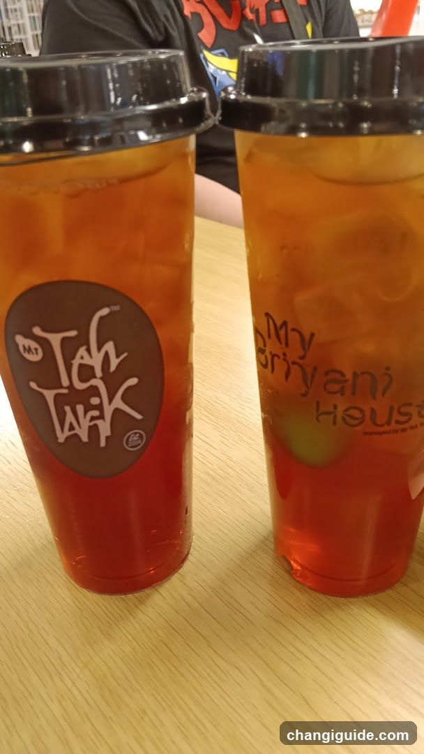 Two iced tea drinks on a table