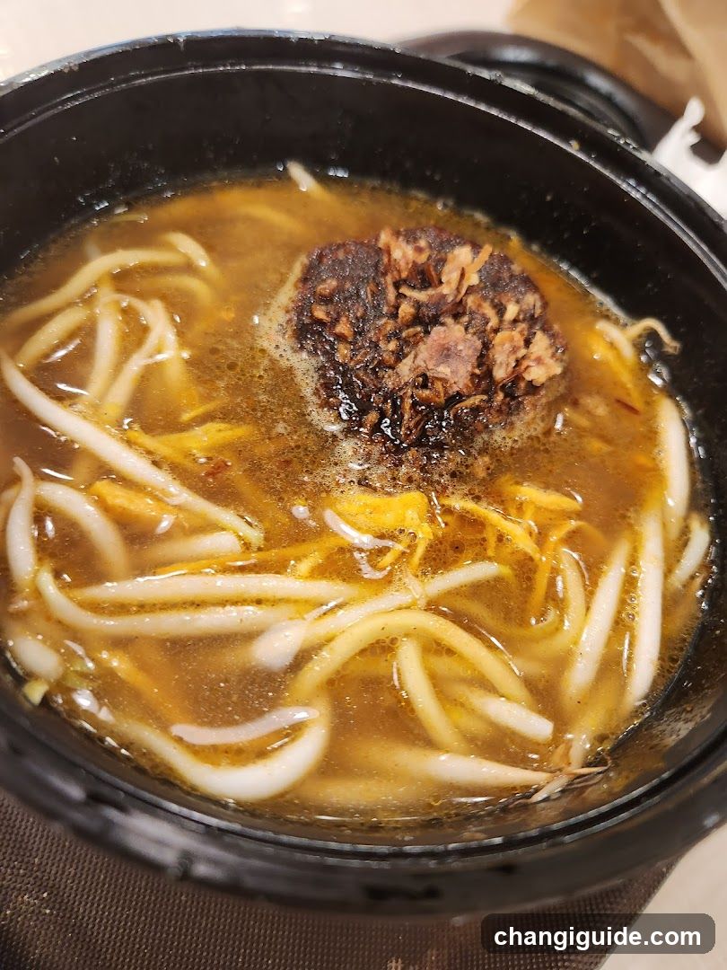 Sizzling Noodle Dish in Clay Pot