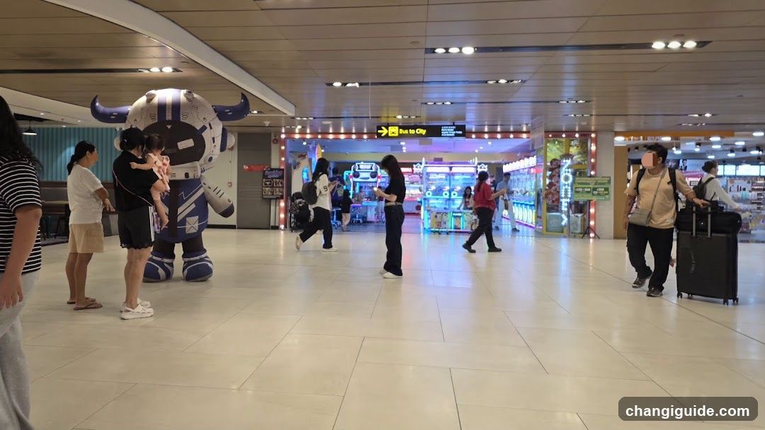 Airport Terminal Interior with Mascot and Arcade Games