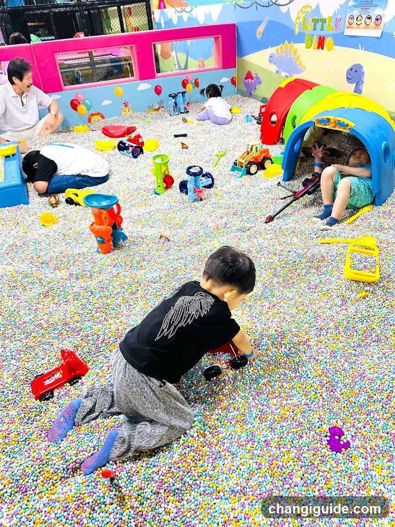 Kids playing in a ball pit