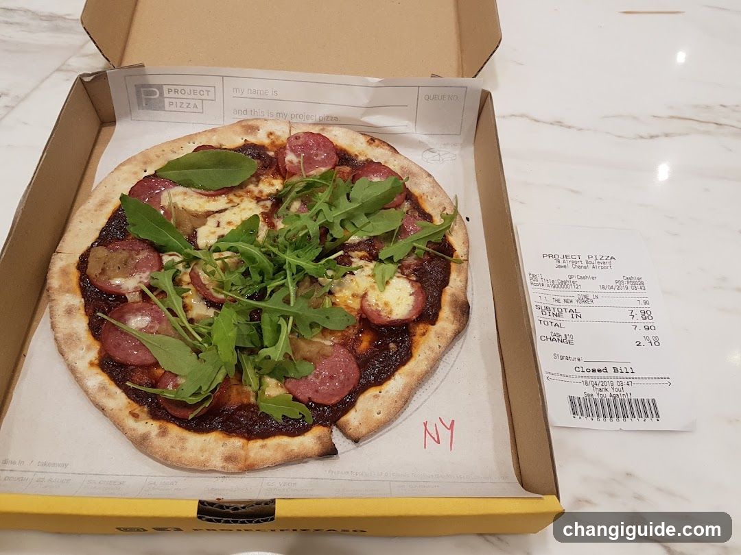 Pizza in box with receipt