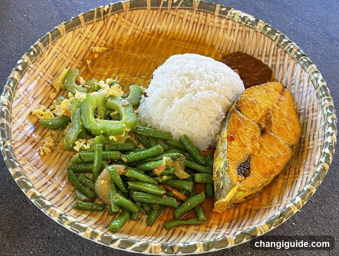 Bowl of Curry Rice with Fish and Vegetables