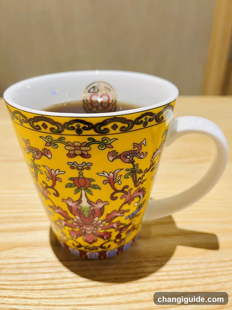 Decorated Mug with Tea