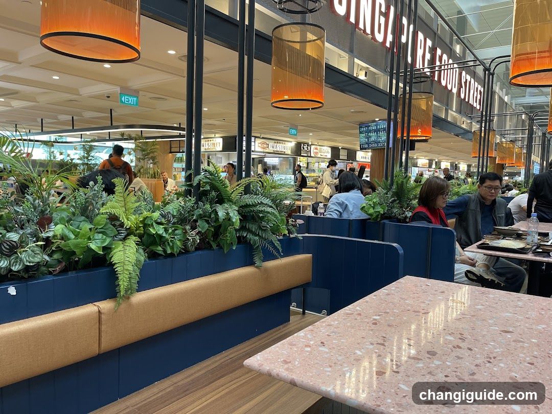 Food Court Interior with Plants and Dining Area