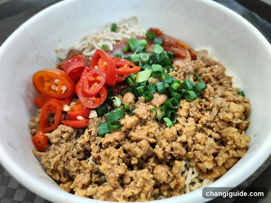 Bowl of Noodles with Minced Meat and Chili