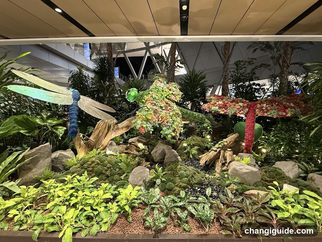 Floral Garden Display with Dragonfly Sculpture