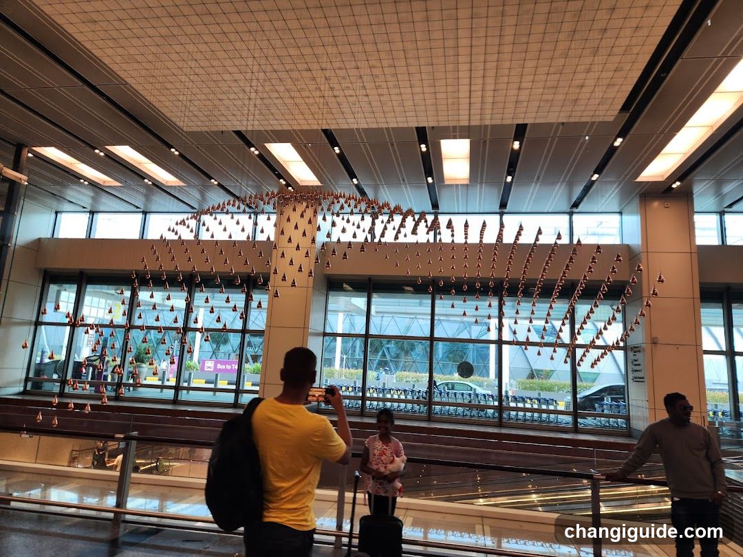 Airport Terminal Interior with Hanging Art Installation