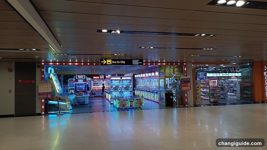 Aisle with arcade games and store entrance