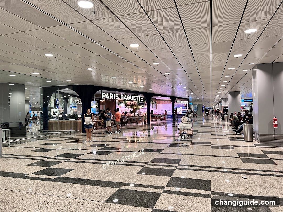 Airport Terminal Interior with Paris Baguette Storefront