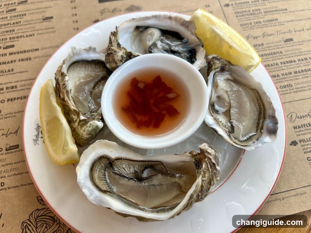 Oysters on the Half Shell with Lemon and Sauce