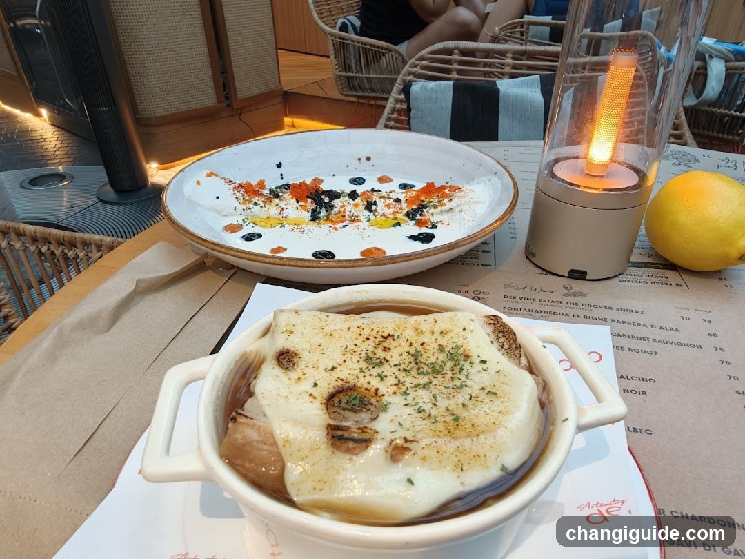 Dining Table with French Onion Soup and Salad