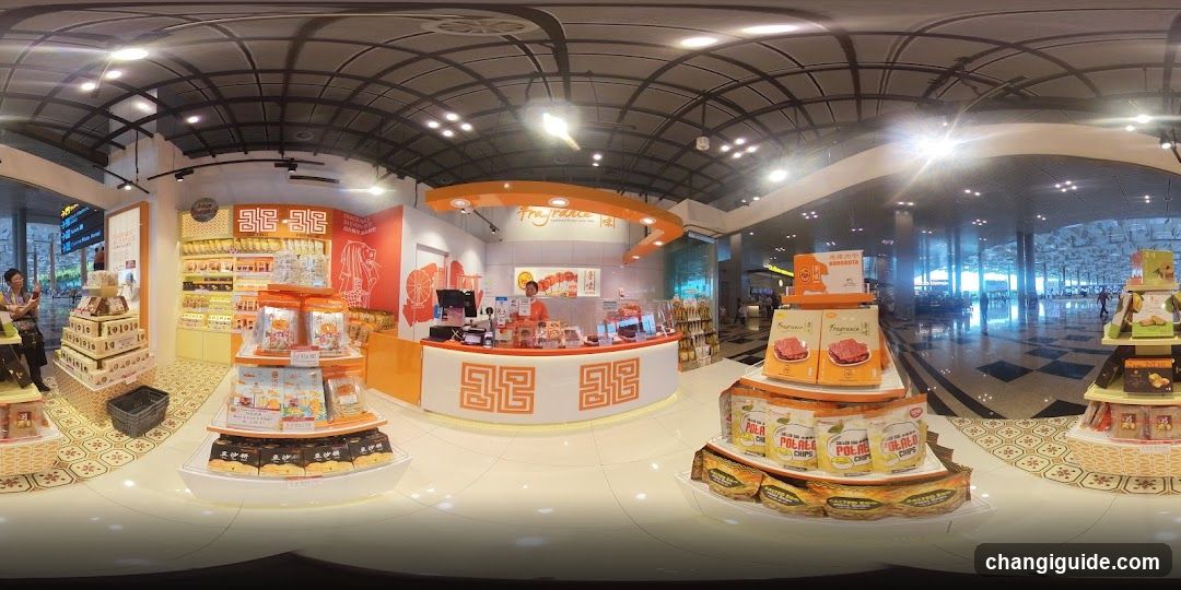 Interior of a food shop with product displays and counter