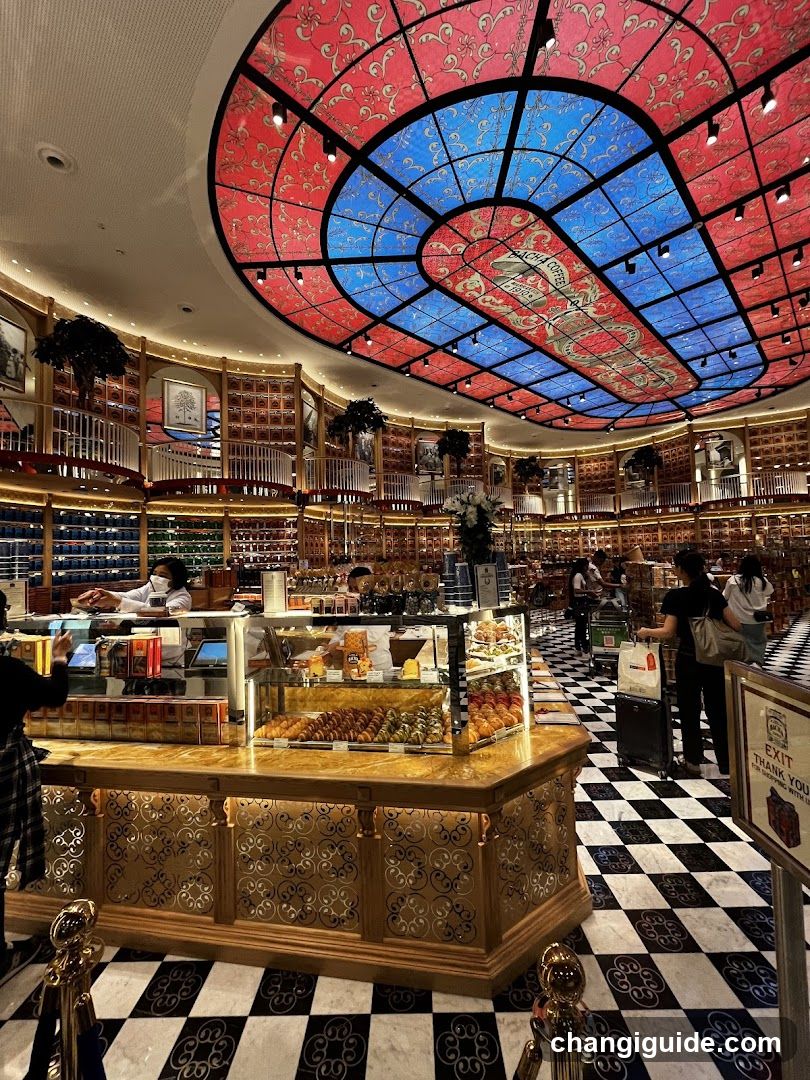 Interior of a Grand Bookstore with Stained Glass Ceiling