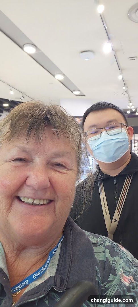 Selfie with two people indoors