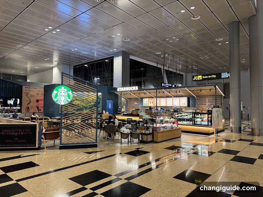 Starbucks and Train to City in Airport Terminal