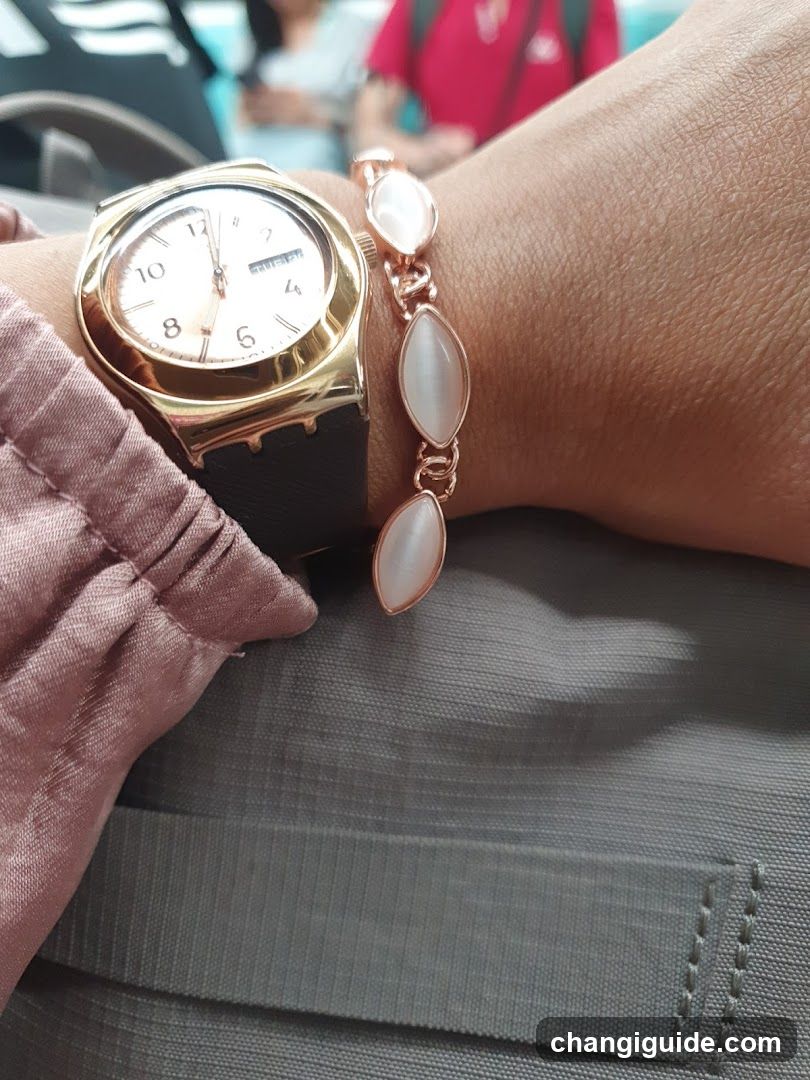 Wristwatch and Bracelet on Arm