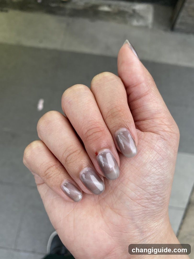 Hand with Gray Nail Polish