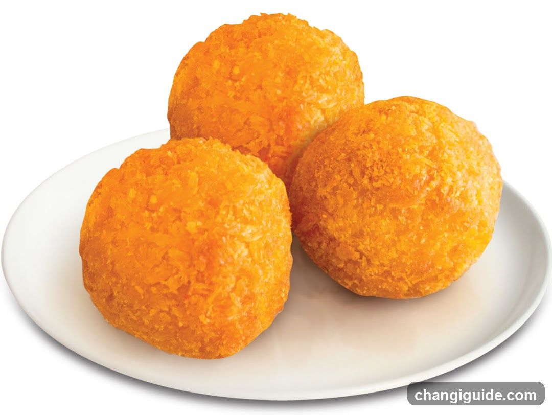 Golden Fried Balls on a White Plate