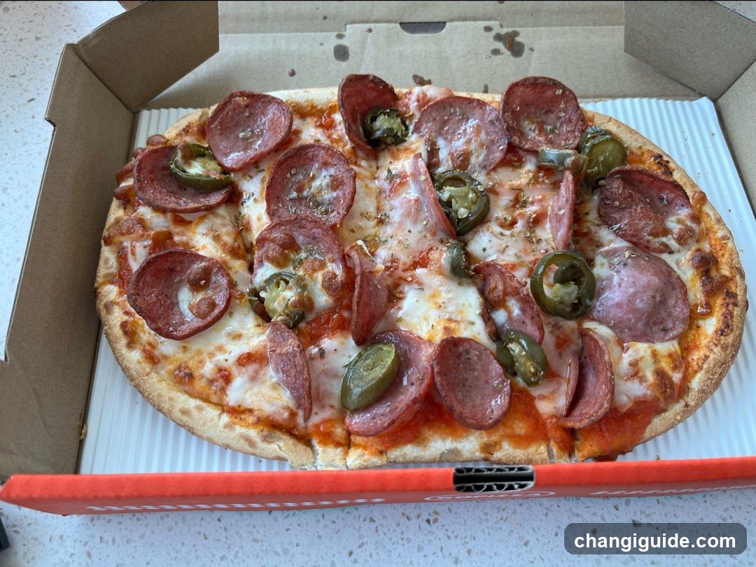 Pepperoni and Jalapeño Pizza in Box