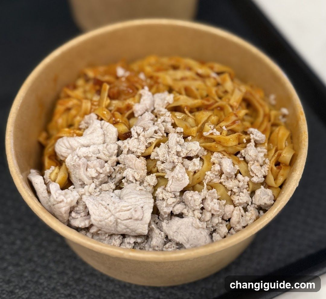 Bowl of noodles with minced meat topping
