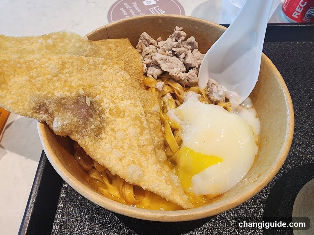Noodle Bowl with Fried Egg and Crispy Skin
