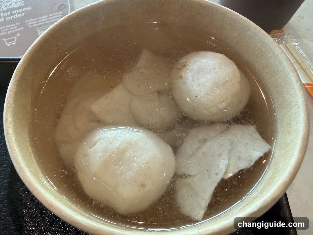 Bowl of Soup with Dumplings
