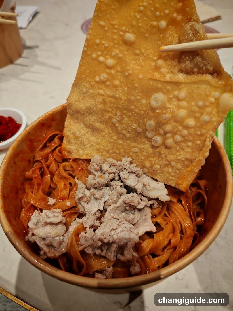 Noodle Bowl with Crispy Skin and Meat