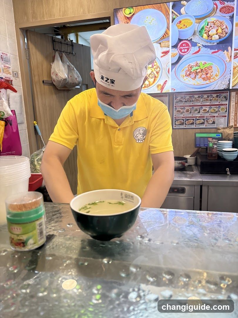 Chef Preparing Soup in Kitchen
