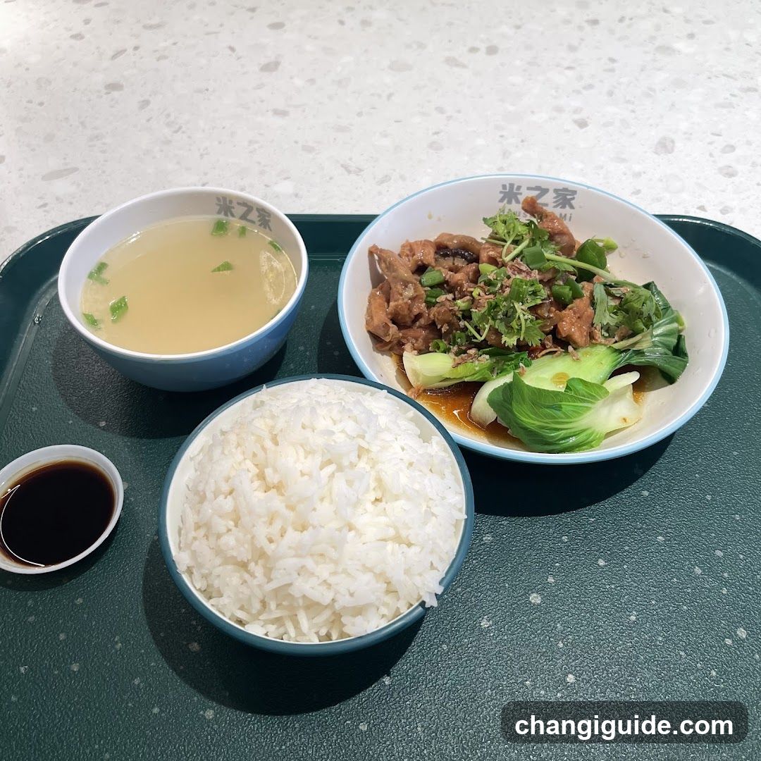 Bowl of food with rice and soup
