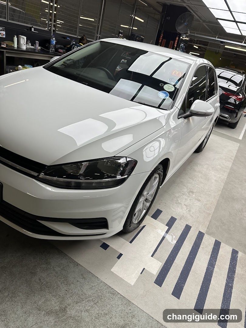 White Car in Workshop