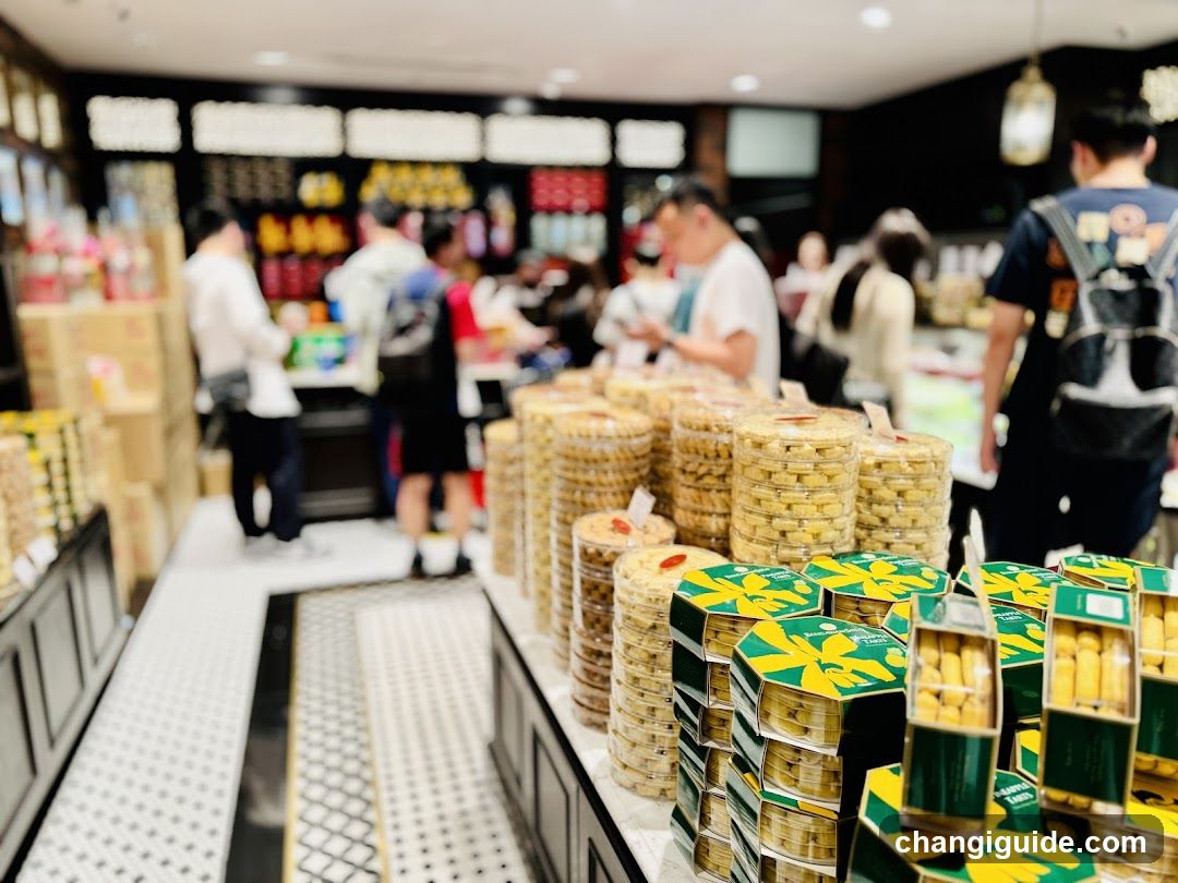 Bakery Shop Interior with Stacks of Pastries and Customers