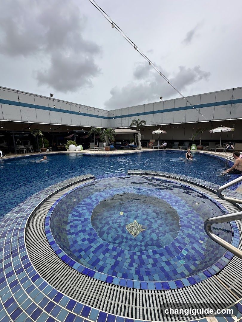 Pool Area with Circular Hot Tub