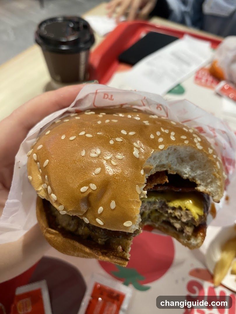 Burger with bite taken out of it