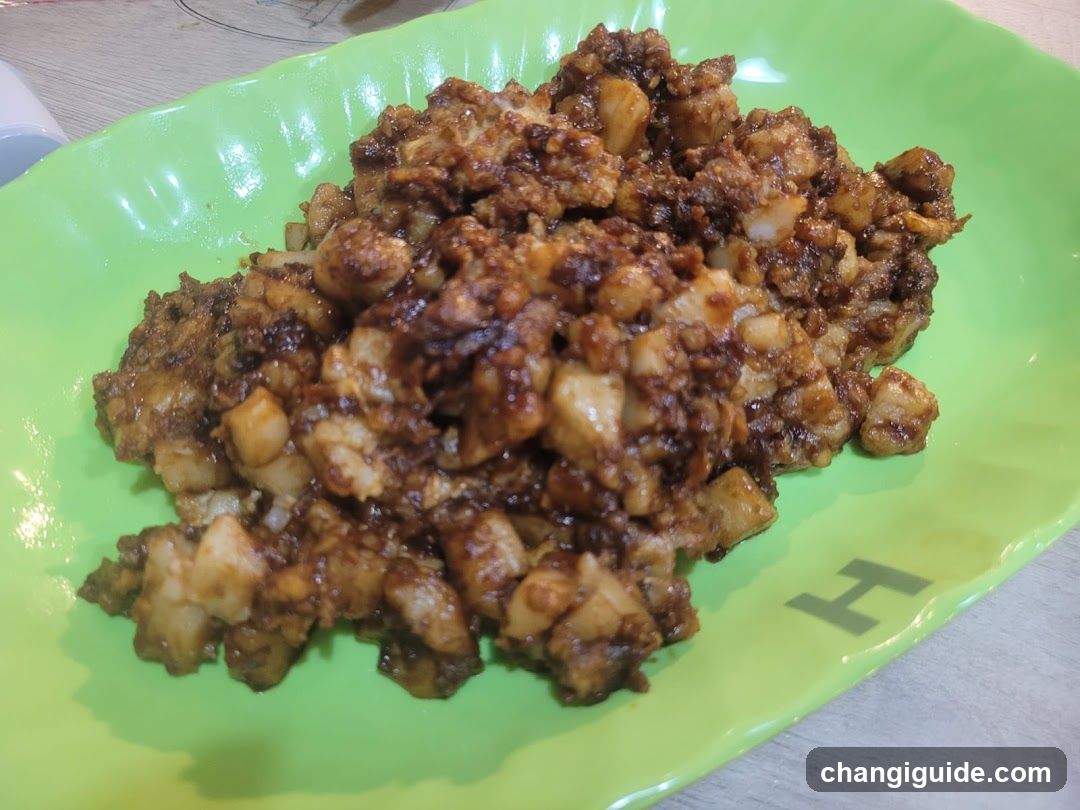 Stir-fried dish on green plate