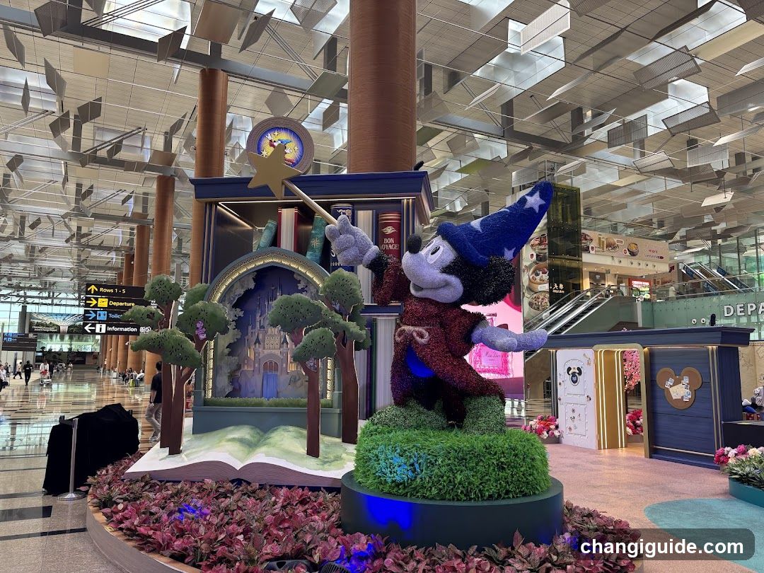 Mickey Mouse Wizard Display at Airport Terminal
