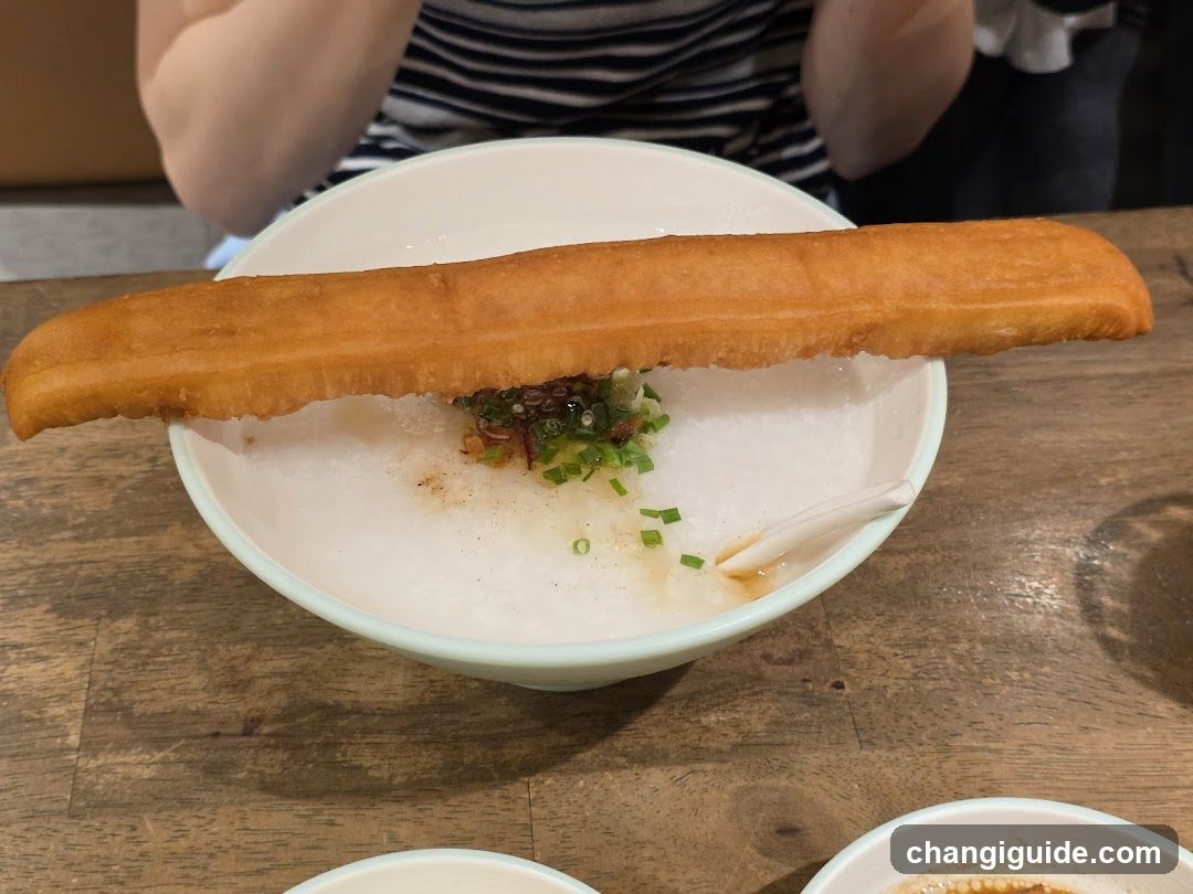 Dish with fried dough stick and congee