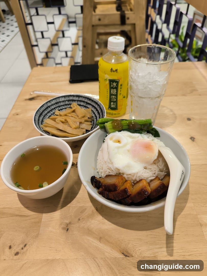 Rice Bowl Meal with Drink and Side Dishes