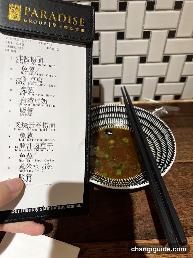 Paradise Group Receipt and Bowl of Soup