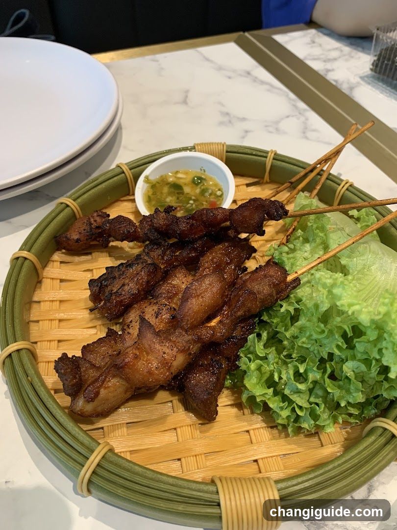 Grilled Meat Skewers with Lettuce and Dipping Sauce