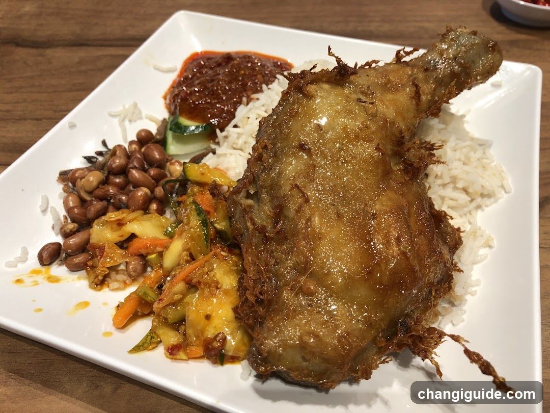 Fried Chicken Leg with Rice and Side Dishes