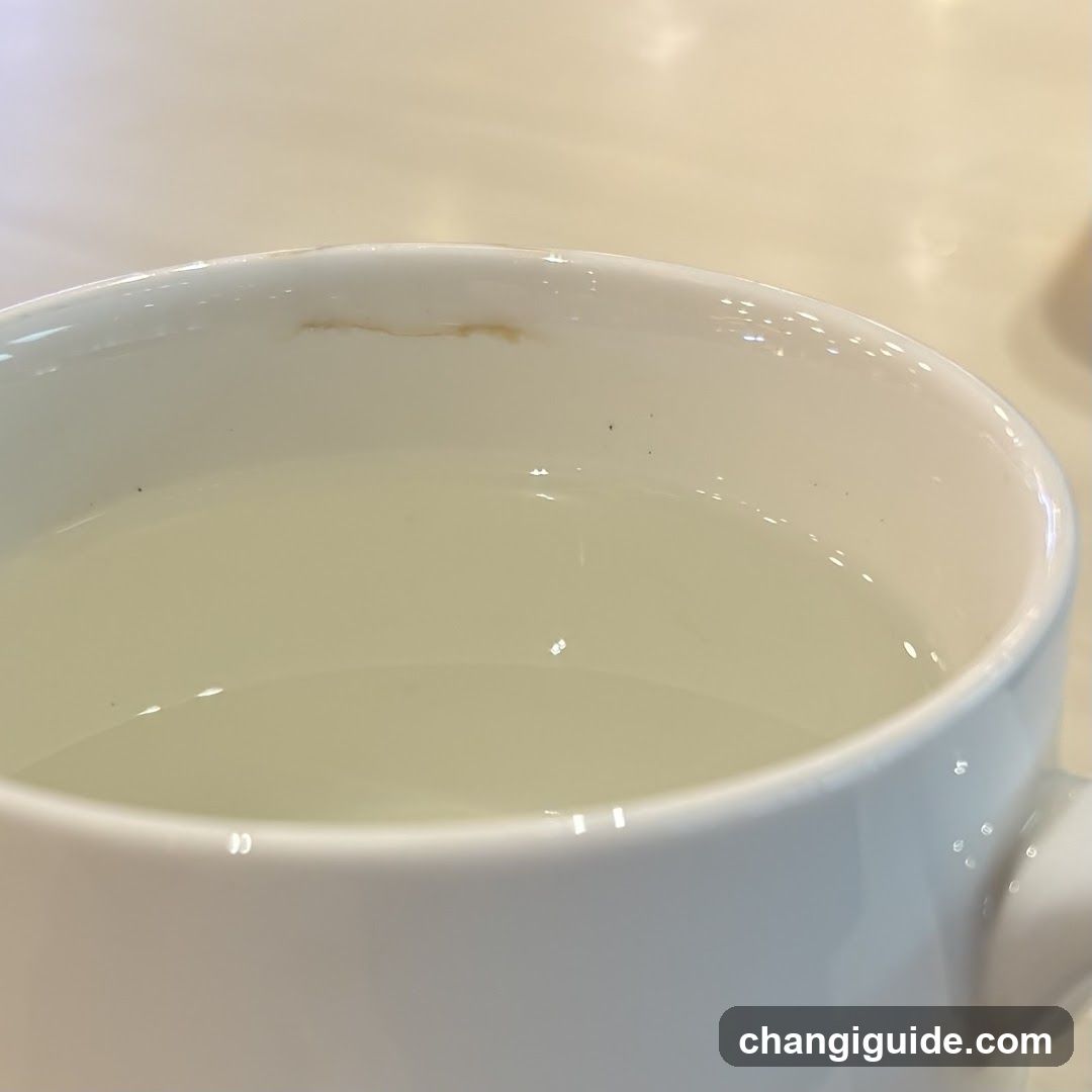 White Cup with Light Liquid