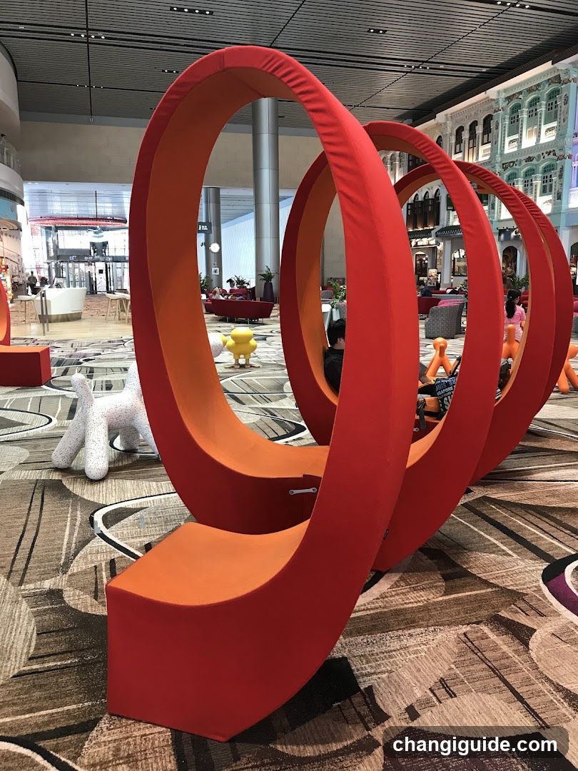 Red Ring Sculpture in Airport Terminal
