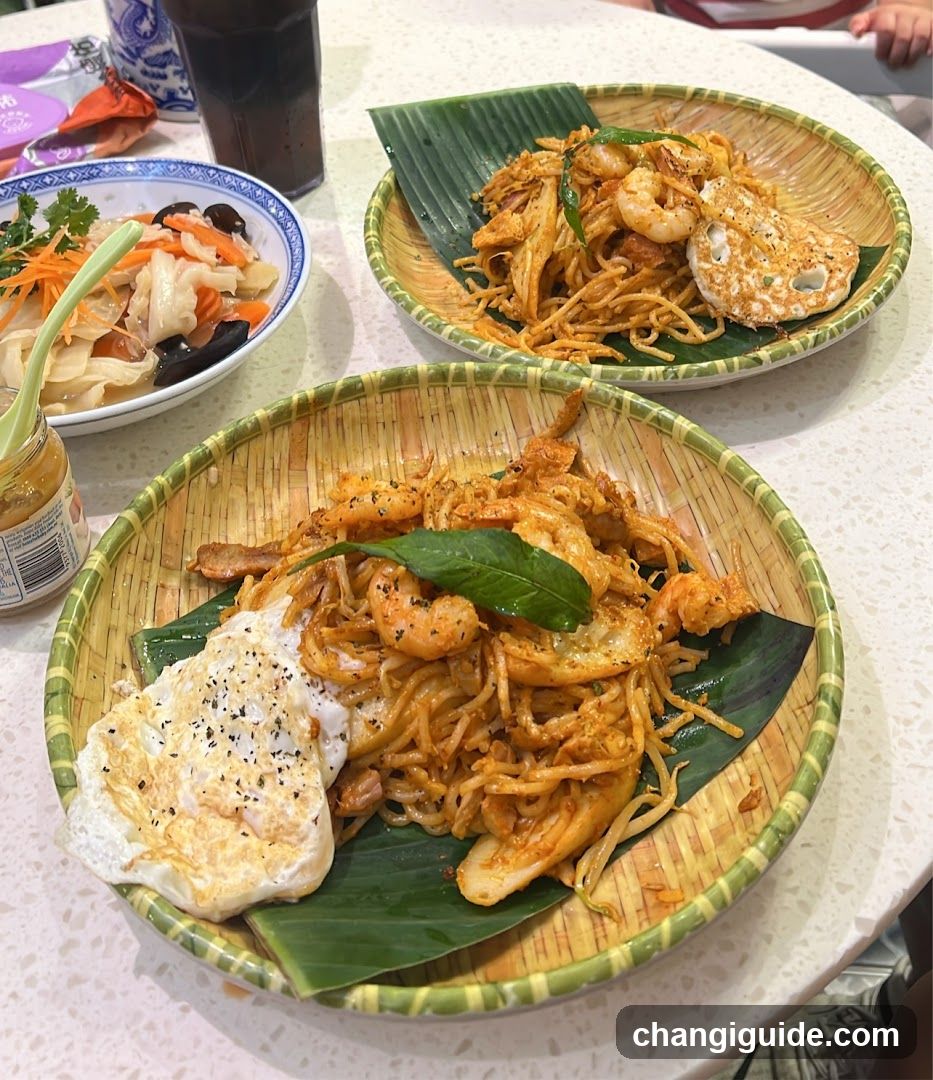 Noodle Dish with Shrimp and Fried Egg