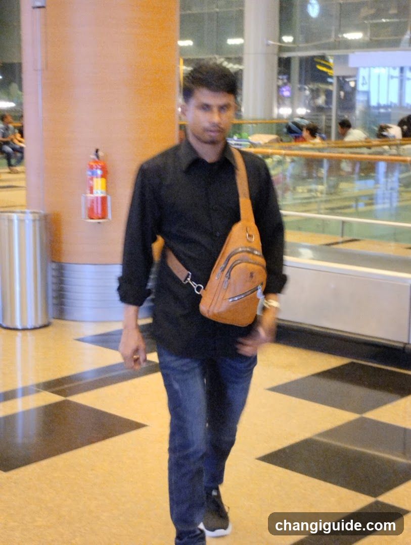 Man Walking in Airport Terminal