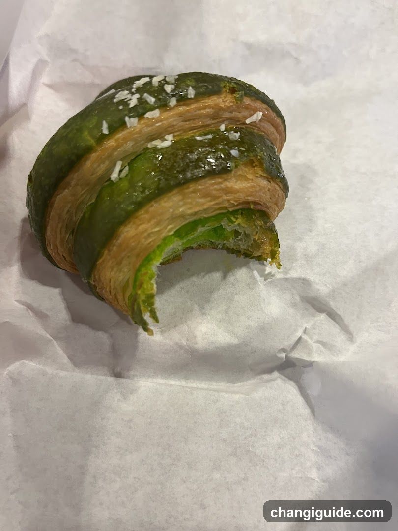 Green Pastry with Coconut Shavings