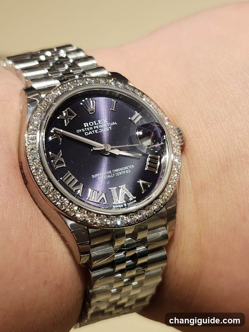 Rolex Datejust with Diamond bezel on wrist